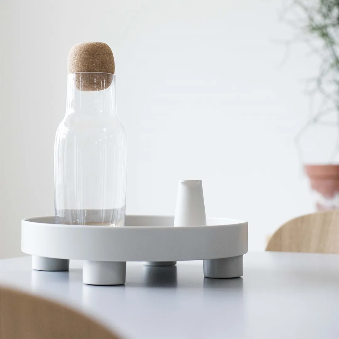 Sure! To optimize the title of an e-commerce product like Platform Tray, we can add specific modifiers to make it more descriptive and appealing. Here is an optimized version:

Adjustable Multi-Use Platform Serving Tray with Non-Slip Surface